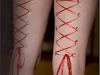 Pierced laced legs